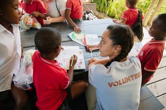 Volunteer connecting with a local child in East Africa